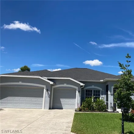 Buy this 4 bed house on 12785 Aston Oaks Drive in Lee County, FL 33912