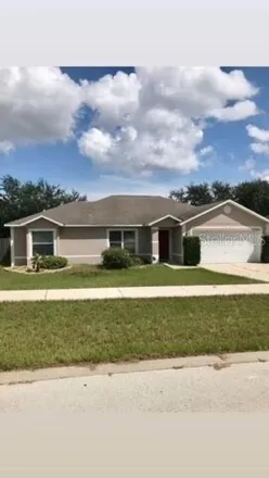 Rent this 3 bed house on 800 Whisper Sound St in Minneola, Florida