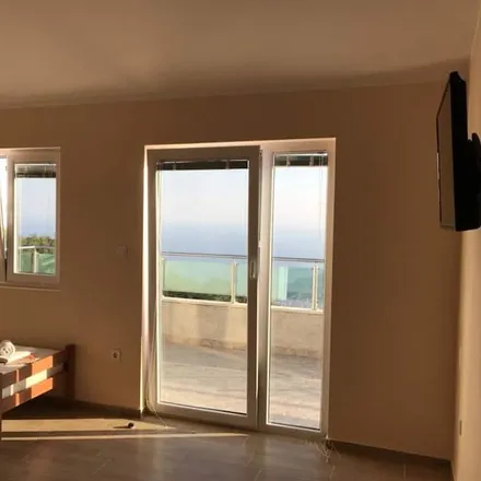 Rent this 6 bed house on Budva