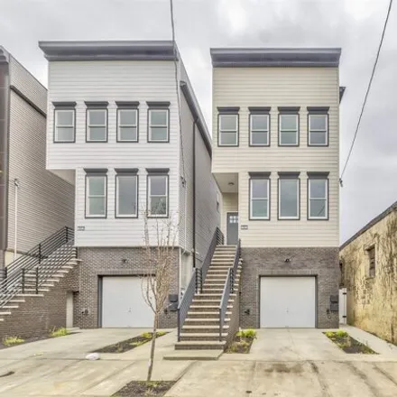 Rent this 3 bed house on 8 Van Horne Street in Communipaw, Jersey City