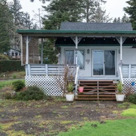 Buy this 2 bed house on 1040 Northeast Voyage Avenue in Lincoln City, OR 97367