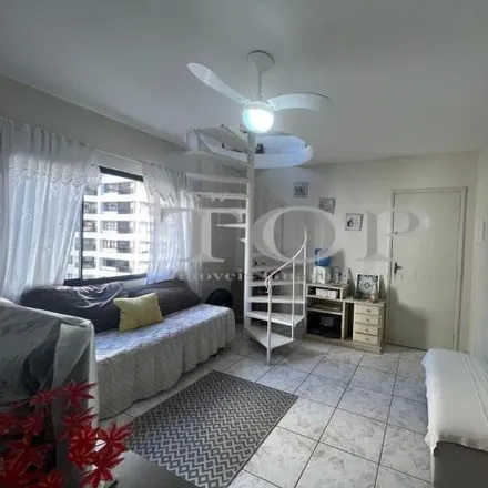 Rent this 3 bed apartment on Avenida General Monteiro de Barros in Pitangueiras, Guarujá - SP