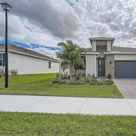 Buy this 4 bed house on 1961 Northeast 23rd Terrace in Jensen Beach, FL 34957