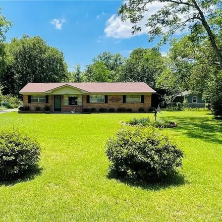Buy this 3 bed house on 423 1st Ave in Saraland, Alabama