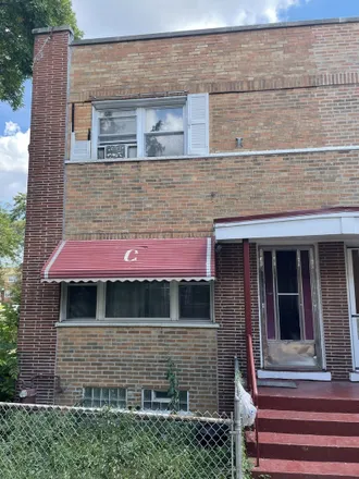 Buy this 2 bed townhouse on 5043 West Jackson Boulevard in Chicago, IL 60644