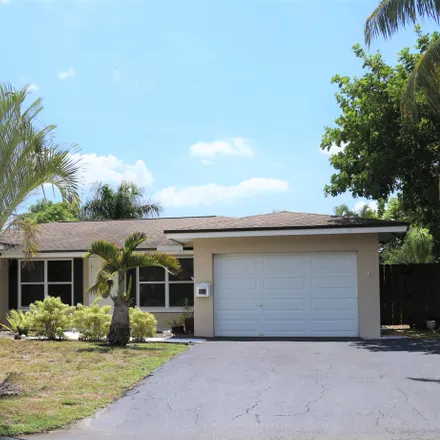 Buy this 3 bed house on 1684 Northeast 52nd Court in Coral Hills, Fort Lauderdale