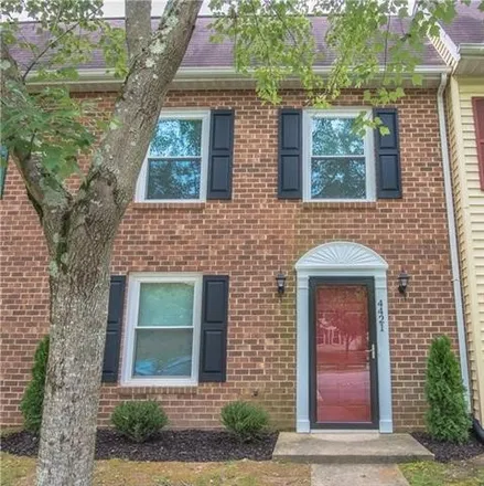 Buy this 3 bed townhouse on 4411 Foxtail Lane in Heckler Village, Henrico County
