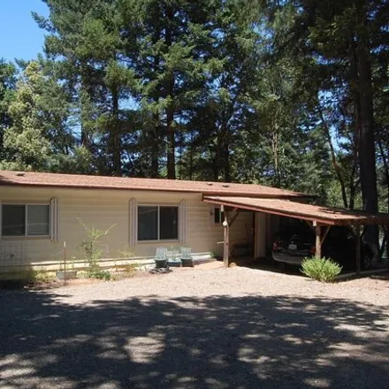 Buy this studio apartment on 376 Hamilton Avenue in Cave Junction, Josephine County