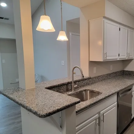 Rent this 2 bed apartment on 607 Ravens Crest Dr