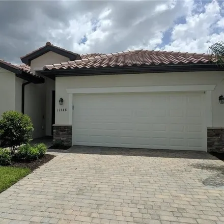 Rent this 4 bed house on 11548 Shady Blossom Dr in Fort Myers, Florida