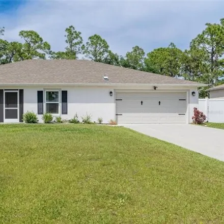 Buy this 4 bed house on 5421 Trumpet Street in North Port, FL 34291