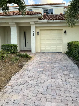 Rent this 2 bed townhouse on 612 Commons Lane in Palm Beach Gardens, FL 33418