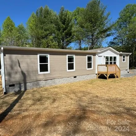 Buy this studio apartment on 123 Field Sparrow Lane in Henderson County, NC 28792