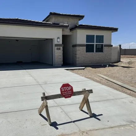 Buy this 4 bed house on 2084 South 240th Drive in Buckeye, AZ 85326