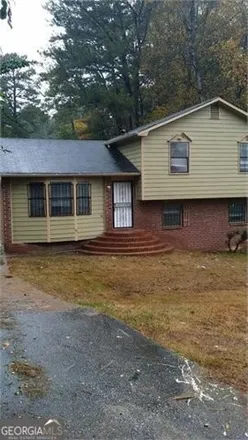 Buy this 4 bed house on 2761 Rockdale Drive in Candler-McAfee, GA 30034