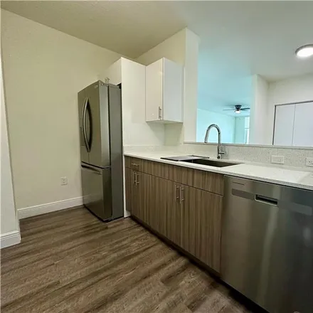 Rent this 3 bed condo on 101 Southwest 13th Street in Miami, FL 33130