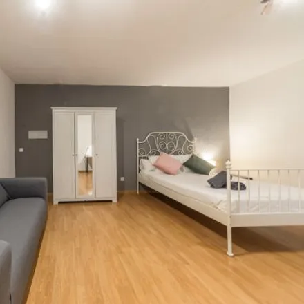 Rent this 8 bed room on Capilla de Nuestra Señora de la Soledad in Calle de Fuencarral, 44