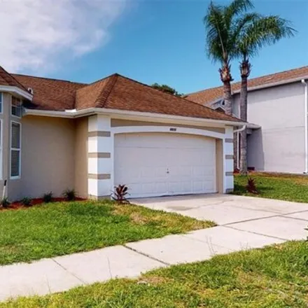 Rent this 3 bed house on 8826 Kensington Court in Four Corners, FL 34747