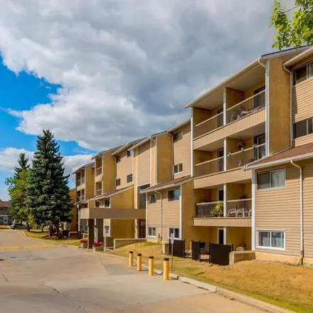 Rent this 3 bed apartment on 624 Hooke Road NW in Edmonton, AB T5A 4L4