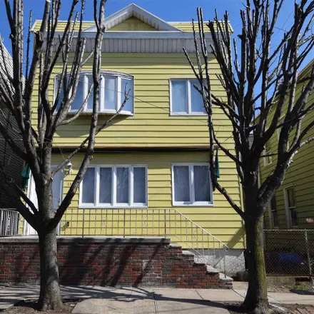 Rent this 2 bed townhouse on 23 New Street in Bayonne, NJ 07002
