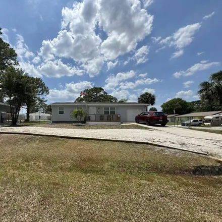 Buy this 3 bed house on 404 San Servando Ave Sw in Palm Bay, Florida