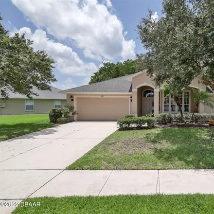 Buy this 4 bed house on 6820 Stoneheath Lane in New Smyrna Beach, FL 32128