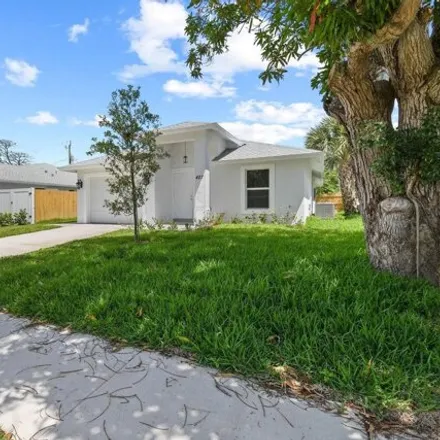Rent this 3 bed house on 473 Barnett Street in West Palm Beach, FL 33405