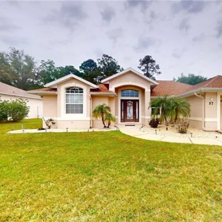 Buy this 3 bed house on 57 Woodbury Drive in Palm Coast, FL 32164