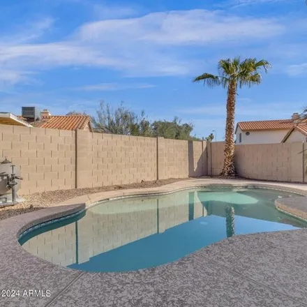 Rent this 3 bed house on 4110 East Woodland Drive in Phoenix, AZ 85048