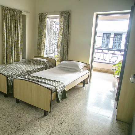 Rent this 4 bed house on Kolkata in New Alipore, IN