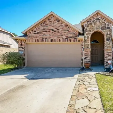 Rent this 4 bed house on 7371 Collins Manor Drive in Harris County, TX 77389