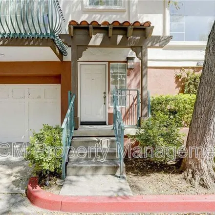 Rent this 2 bed apartment on 2871-2893 Player Lane in Tustin, CA 92782
