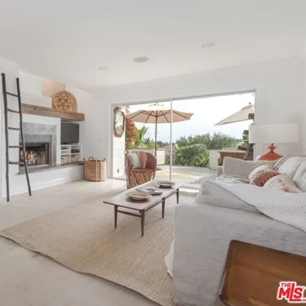 Rent this 2 bed condo on Pacific Coast Highway in Malibu, CA