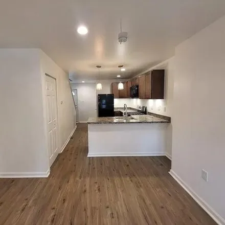 Rent this 2 bed townhouse on 3118 Page Street in Philadelphia, PA 19121