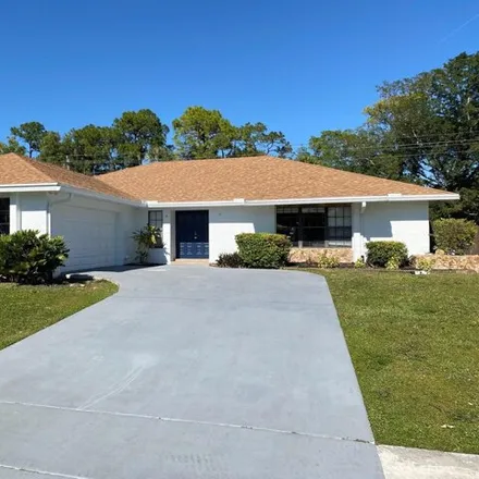 Rent this 4 bed house on 104 Old Country Road in Wellington, Palm Beach County