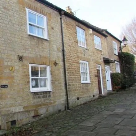 Rent this 2 bed townhouse on Church Street in Crewkerne, TA18 7HR