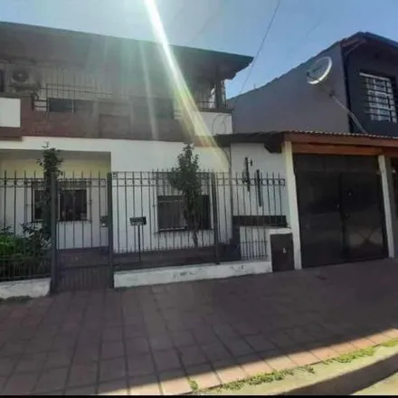 Buy this 4 bed house on Fray J. N. González in Partido de La Matanza, B1778 FQA Ciudad Evita