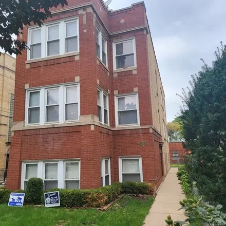 Rent this 3 bed apartment on 5112 West Sunnyside Avenue in Chicago, IL 60630