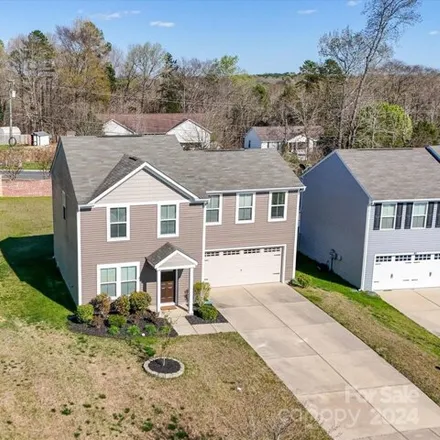Buy this 4 bed house on 1092 Tangle Ridge Drive Southeast in Concord, NC 28025