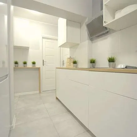 Rent this 8 bed apartment on Gustawa Morcinka 32 in 01-496 Warsaw, Poland