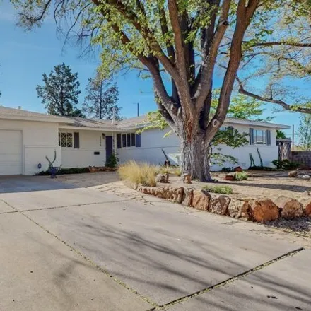 Buy this 5 bed house on 3500 Cardenas Drive Northeast in Albuquerque, NM 87110