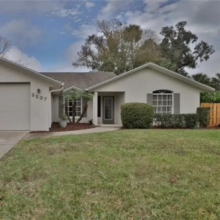 Buy this 4 bed house on 2237 Doster Drive in New Smyrna Beach, FL 32168