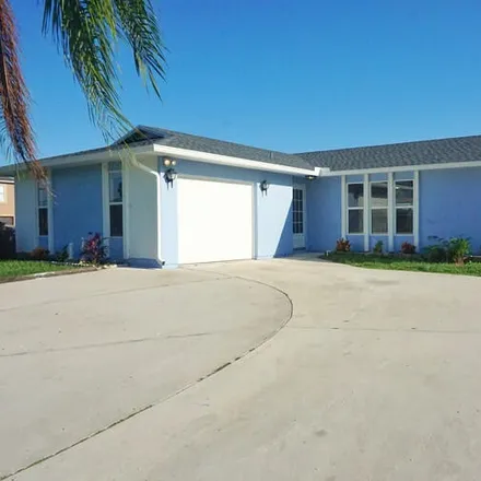 Buy this 3 bed house on 112 Southwest Carter Avenue in Port Saint Lucie, FL 34983
