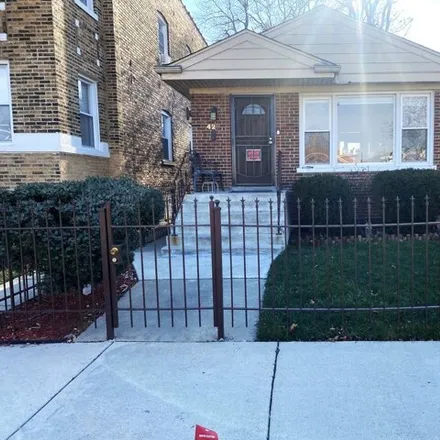 Buy this 2 bed house on 429 East 91st Place in Chicago, IL 60619