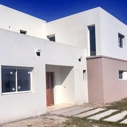 Buy this 4 bed house on Avenida San Martín 434 in Partido de Escobar, B1625 AAF Belén de Escobar