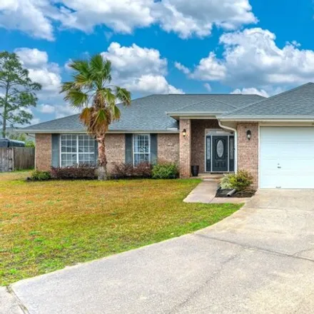 Buy this 4 bed house on 2136 Ainsdale Court in Navarre, FL 32566