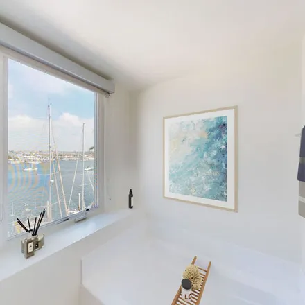 Rent this 4 bed apartment on AMLI Building 6 in Via Marina, Venice Canal Historic District