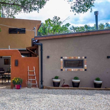 Rent this 2 bed house on Espinoza Rd in Ranchos de Taos, NM