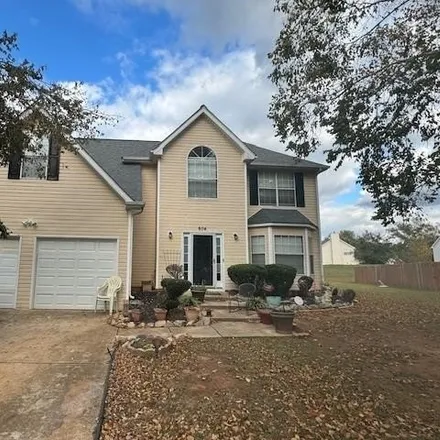 Rent this 4 bed house on 698 Thrasher Court in Locust Grove, GA 30248