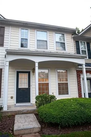Rent this 2 bed townhouse on Hidden Cove Circle in Peachtree Corners, GA 30092